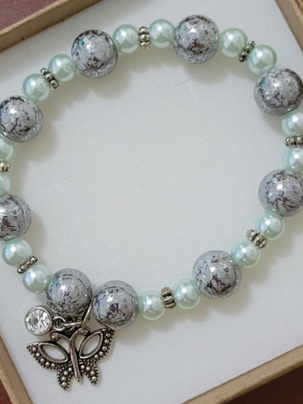Elegant Soft Colored Green Beads with Silver White Beads and Charm